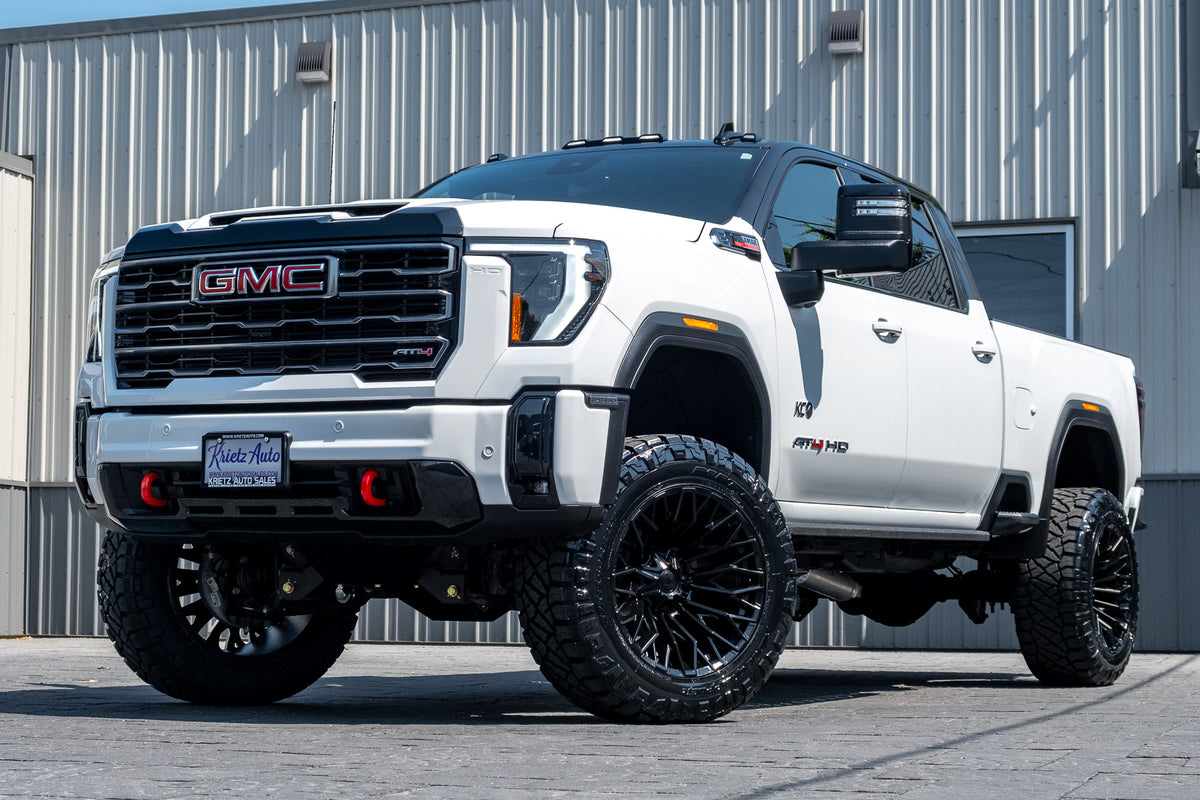 2025 GMC Sierra 2500 AT4 with a 5" BDS lift kit, 22x12 Fuel Strike wheels, and 37" Nitto Ridge Grappler tires.