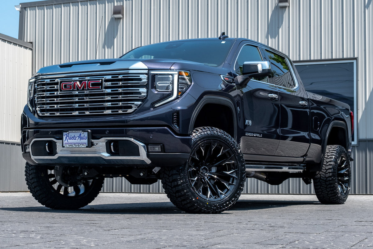 2025 GMC Sierra 1500 Denali with a 6" BDS lift kit, 22x12 Fuel Flame wheels, and 35" Fury Country Hunter R/T tires.