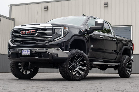 2024 GMC Sierra 1500 SLT with a 6" Rough Country lift kit, 22x12 Fuel Contra wheels, and 35" Fury Country Hunter R/T tires.