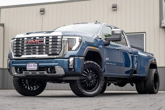 2025 GMC Sierra 3500 Denali with a 3" Cognito leveling kit, 22x8.25 Fuel Arc wheels, and 35" Nitto Ridge Grappler tires.