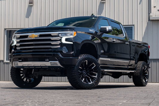 2024 Chevrolet Silverado 1500 High Country with a 6" Rough Country lift kit, 22x12 Fuel Rebar tires, and 35" Avix Trailtek R/T tires.