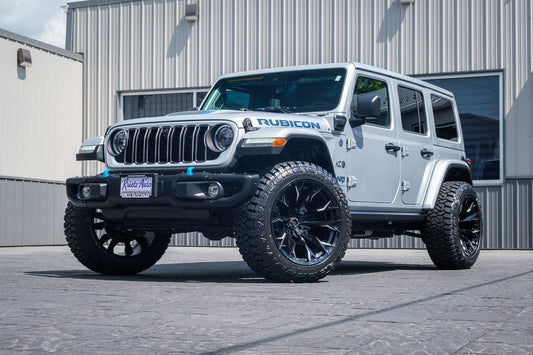 2024 Jeep Wrangler Rubicon 4XE with Jeep Stock suspension, 22x12 Fuel Flame wheels, and 35" Fury Country Hunter R/T tires.