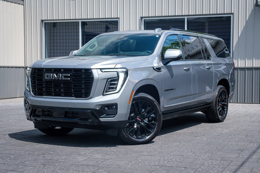2025 GMC Yukon XL Denali with GMC Factory suspension, 22x9 GMC Stock wheels, and Bridgestone Alenza tires.