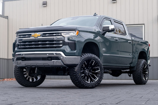 2025 Chevrolet Silverado 1500 LTZ with a 6" Rough Country lift kit, 22x12 Fuel Rebar wheels, and 35" Fury Country Hunter R/T tires.