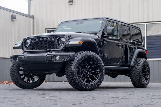 2024 Jeep Wrangler Sport with a 2.5" Rough Country lift kit, 22x12 Fuel Rebar wheels, and 35" Fury Country Hunter R/T tires.