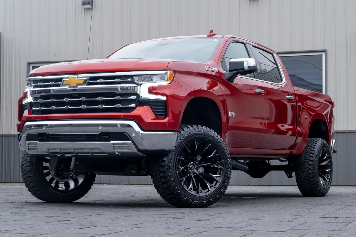 2025 Chevrolet Silverado 1500 LTZ with a 6" Rough Country lift kit, 22x12 Fuel Flame wheels, and 35" Fury Country Hunter R/T tires.
