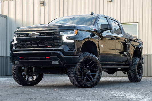 2025 Chevrolet Silverado 1500 LT Trail Boss with a 6" Rough Country lift kit, 22x12 Fuel Flux wheels, and 35" Fury Country Hunter R/T tires.