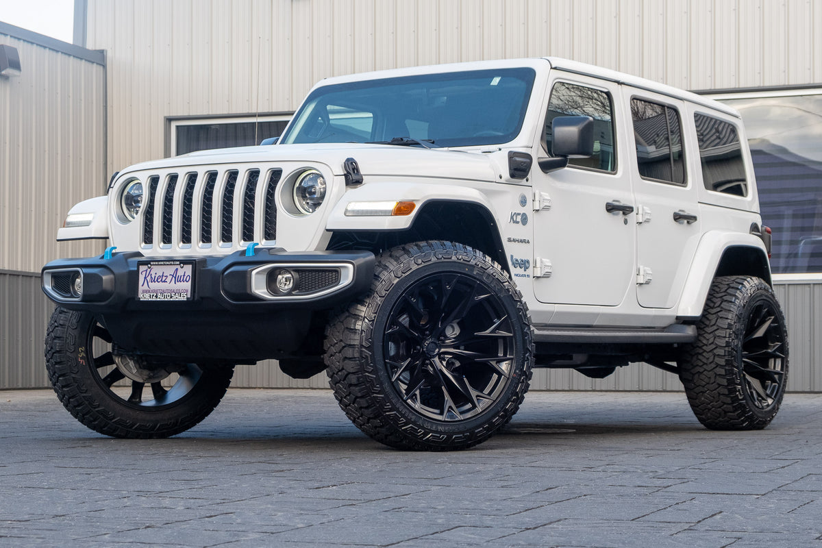 2023 Jeep Wrangler Sahara 4XE with a 2.5" Rough Country lift kit, 22x12 Fuel Flame wheels, and 35" Fury Country Hunter R/T tires.