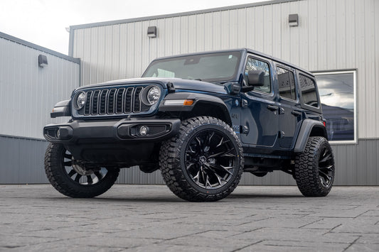 2025 Jeep Wrangler Sport S 4XE with a 2.5" Rough Country lift kit, 22x12 Fuel Flame wheels, and 35" Fury Country Hunter R/T tires.