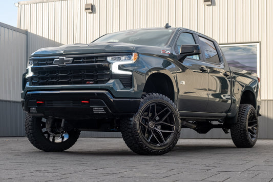 2025 Chevrolet Silverado 1500 LT Trail Boss with a 6" Rough Country lift kit, 22x12 Fuel Flux wheels, and 35" Fury Country Hunter R/T tires.