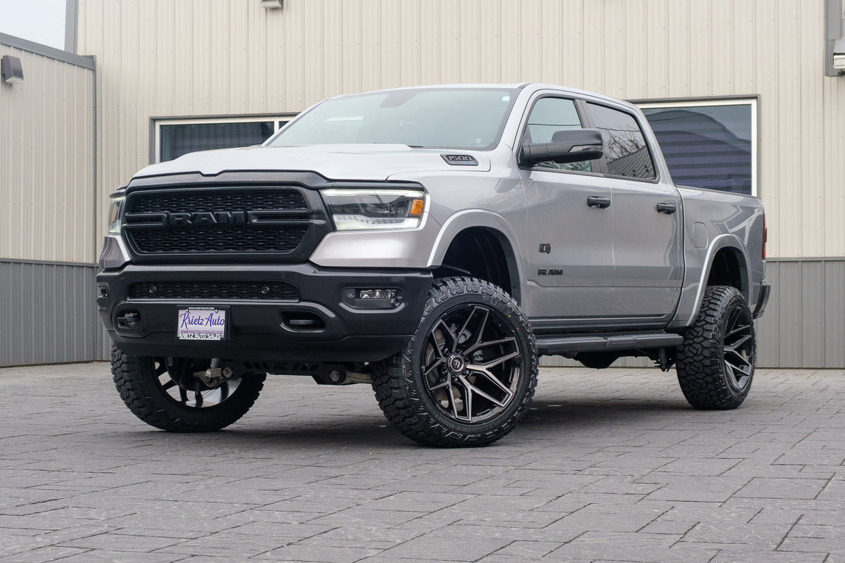 2024 Ram 1500 Lone Star with a 6" Rough Country lift kit, 22x12 Fuel Flux wheels, and 35" Fury Country Hunter R/T tires.