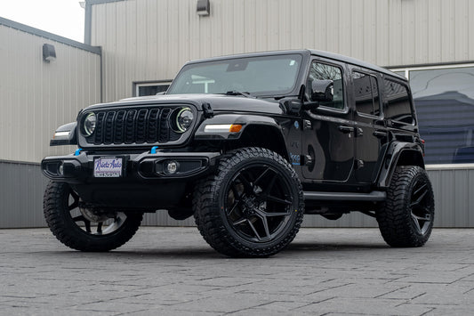 2024 Jeep Wrangler High Altitude 4XE with a 2.5" Rough Country lift kit, 22x12 Fuel Flux wheels, and 35" Avix Trailtek R/T tires.