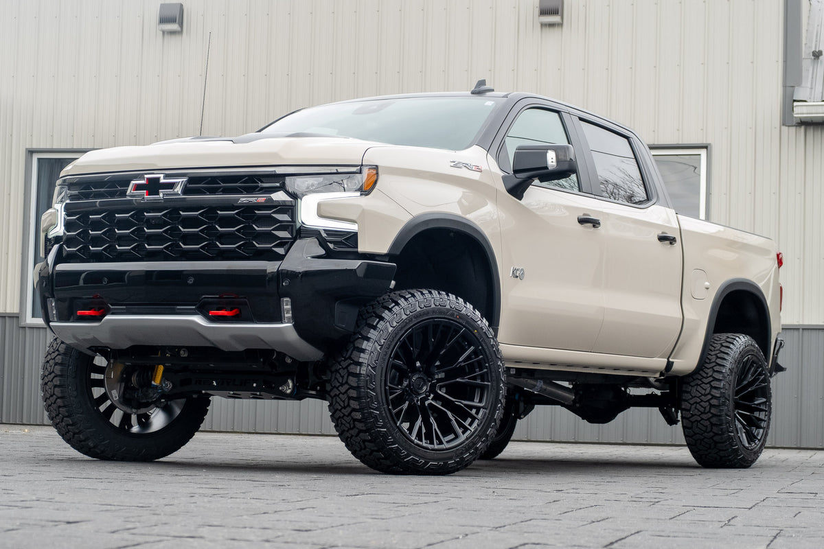 2026 Chevrolet Silverado 1500 ZR2 with a 4" ReadyLift lift kit, 22x12 Fuel Rebar wheels, and 35" Fury Country Hunter R/T tires.