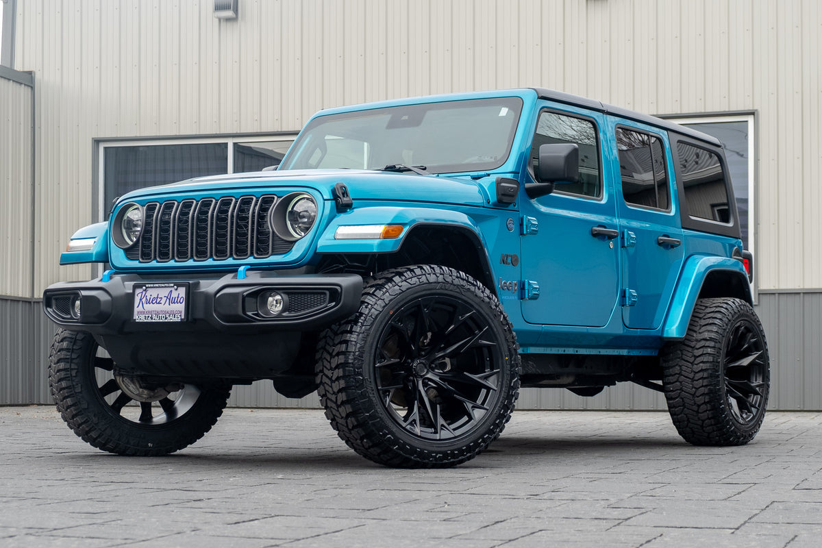 2024 Jeep Wrangler Willys 4XE with a 2.5" Rough Country lift kit, 22x12 Fuel Flame wheels, and 35" Avix Trailtek R/T tires.