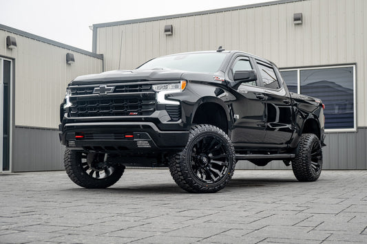 2025 Chevrolet Silverado 1500 LT Trail Boss with a 6" Rough Country lift kit, 22x12 Fuel Blitz wheels, and 35" Fury Country Hunter R/T tires.