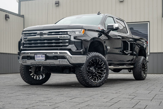 2024 Chevrolet Silverado 1500 LTZ with a 6" Rough Country lift kit, 22x12 Fuel Strike wheels, and 35" Fury Country Hunter R/T tires.