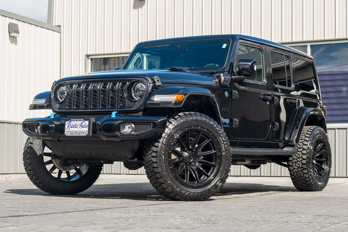 2024 Jeep Wrangler High Altitude 4XE with a 2.5" Rough Country lift kit, 22x10 Fuel Piston wheels, and 35" Fury Country Hunter R/T tires.