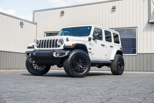 2025 Jeep Wrangler Sahara 4XE with a 2.5" Rough Country lift kit, 20x10 Fuel Sigma wheels, and 35" Avix Trailtek R/T tires.