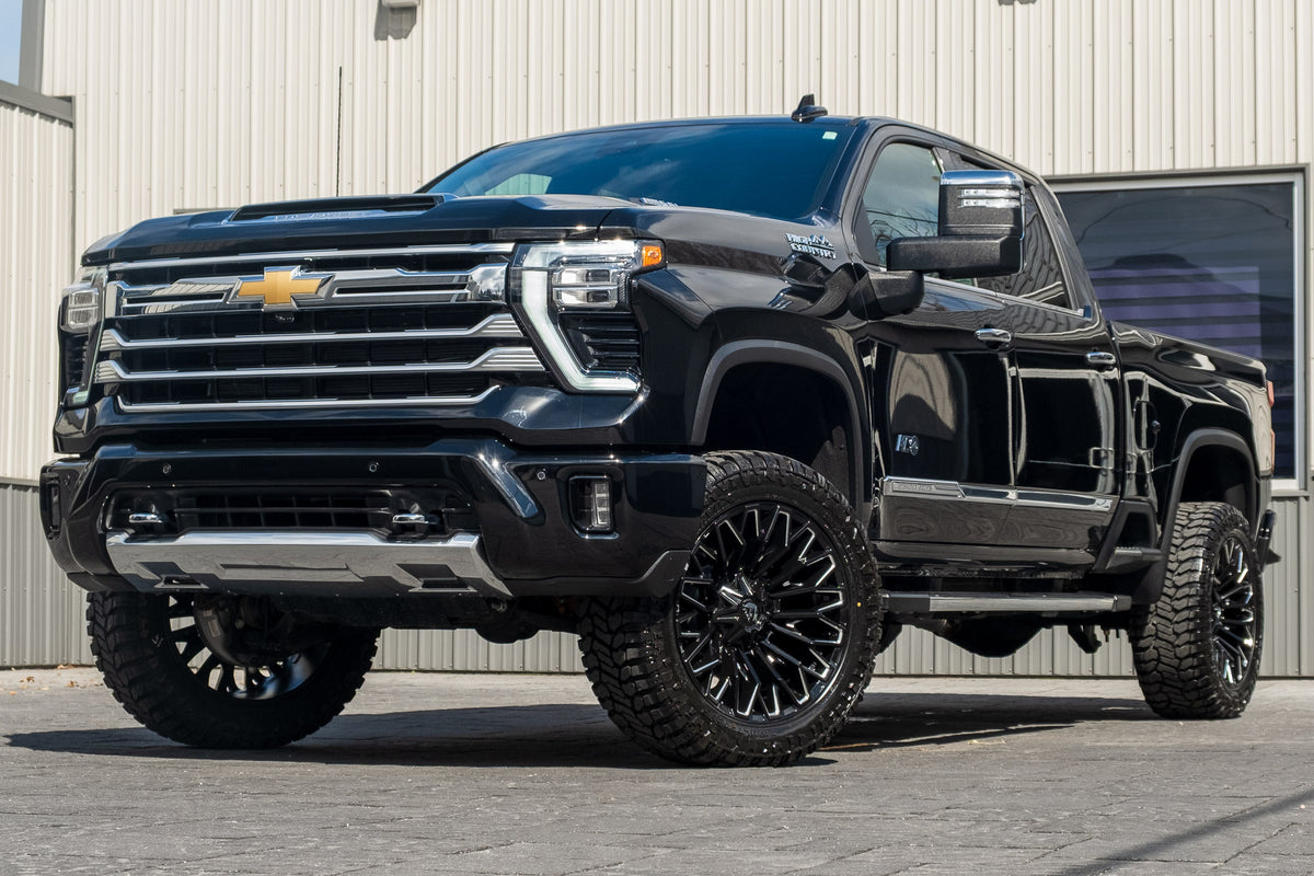 2025 Chevrolet Silverado 2500 High Country with a 3.5" Wicked lift kit, 22x12 Fuel Strike wheels, and 35" Avix Trailtek R/T tires.