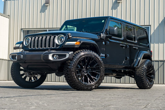 2025 Jeep Wrangler Sahara 4XE with a 2.5" Rough Country lift kit, 22x12 Fuel Rebar wheels, and 35" Fury Country Hunter R/T tires.