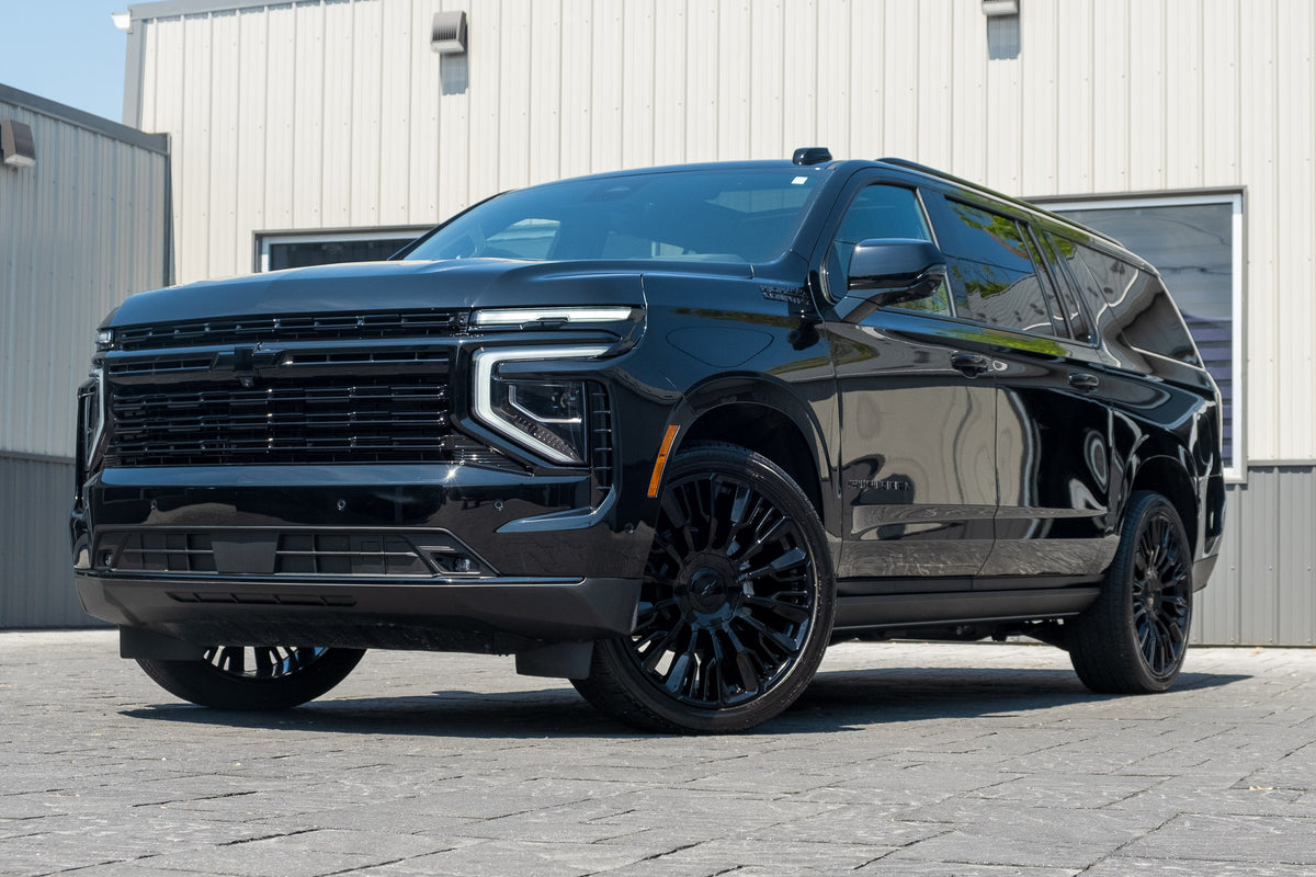 2025 Chevrolet Suburban High Country with Chevrolet Factory suspension, 24x9.5 Chevrolet Stock wheels, and Bridgestone Alenza tires.