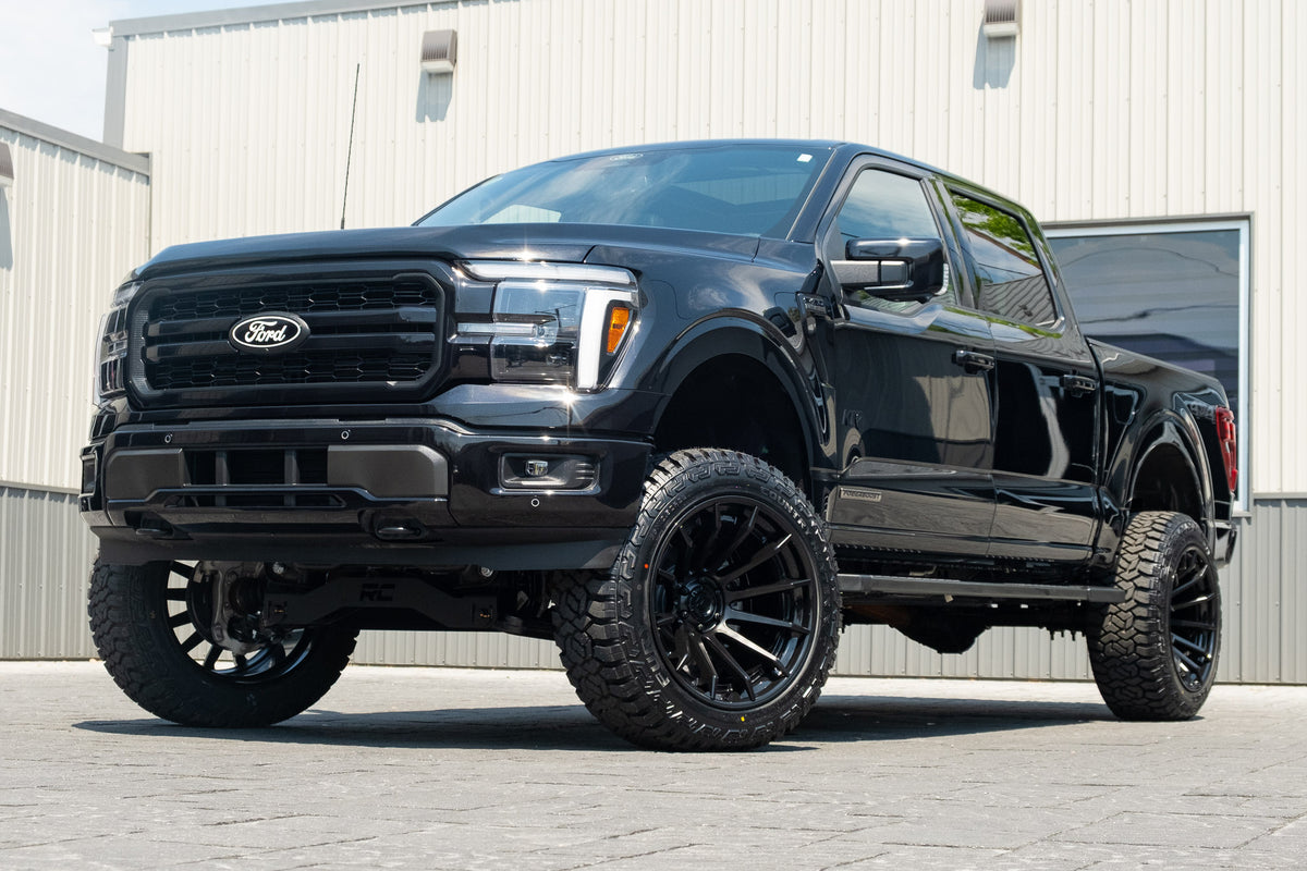 2025 Ford F-150 Lariat with a 6" Rough Country lift kit, 22x12 Fuel Burn wheels, and 35" Fury Country Hunter R/T tires.