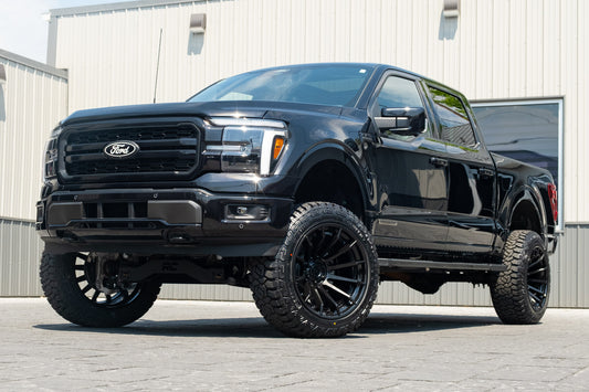 2025 Ford F-150 Lariat with a 6" Rough Country lift kit, 22x12 Fuel Burn wheels, and 35" Fury Country Hunter R/T tires.