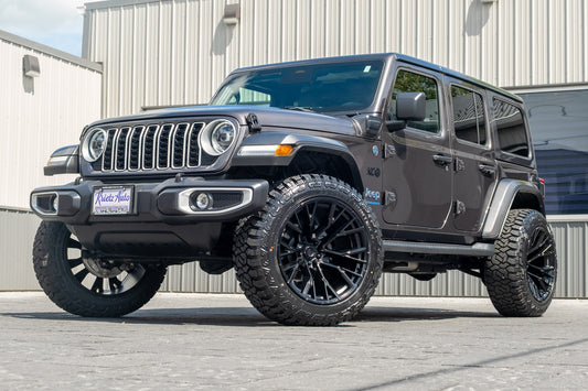 2025 Jeep Wrangler Sahara 4XE with a 2.5" Rough Country lift kit, 22x12 Fuel Rebar wheels, and 35" Fury Country Hunter R/T tires.
