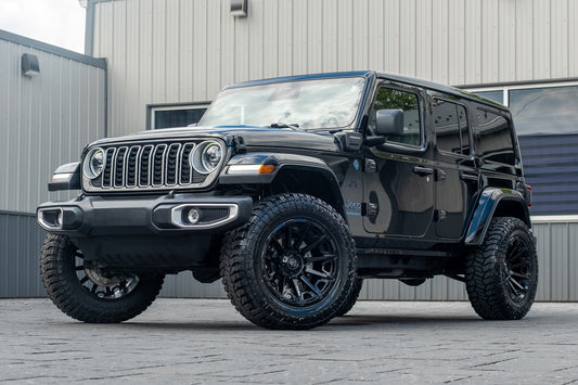 2025 Jeep Wrangler Sahara 4XE with a 2.5" Rough Country lift kit, 20x10 Fuel Grip wheels, and 35" Fury Country Hunter R/T tires.