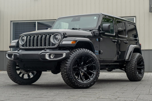 2025 Jeep Wrangler Sahara 4XE with a 2.5" Rough Country lift kit, 22x12 Fuel Flame wheels, and 35" Fury Country Hunter R/T tires.
