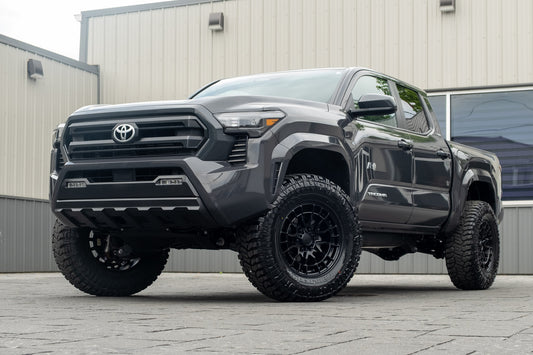 2026 Toyota Tacoma SR5 with a 3" ReadyLift lift kit, 18x9 Fuel Revolt wheels, and 35" Avix Trailtek R/T tires.