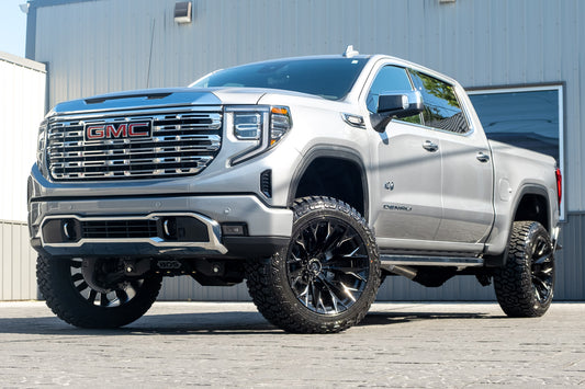 2026 GMC Sierra 1500 Denali with a 6" BDS lift kit, 22x12 Fuel Flame wheels, and 35" Fury Country Hunter R/T tires.