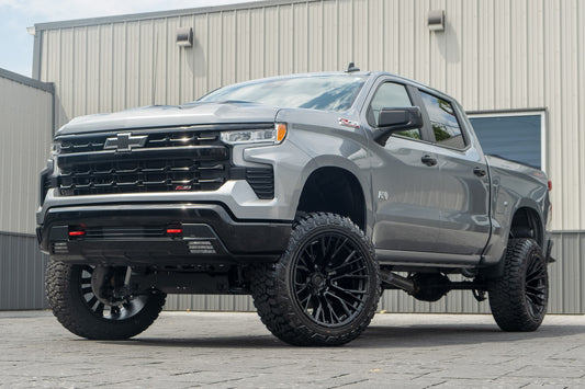 2026 Chevrolet Silverado 1500 LT Trail Boss with a 6" Rough Country lift kit, 22x12 Fuel Rebar wheels, and 35" Fury Country Hunter R/T tires.