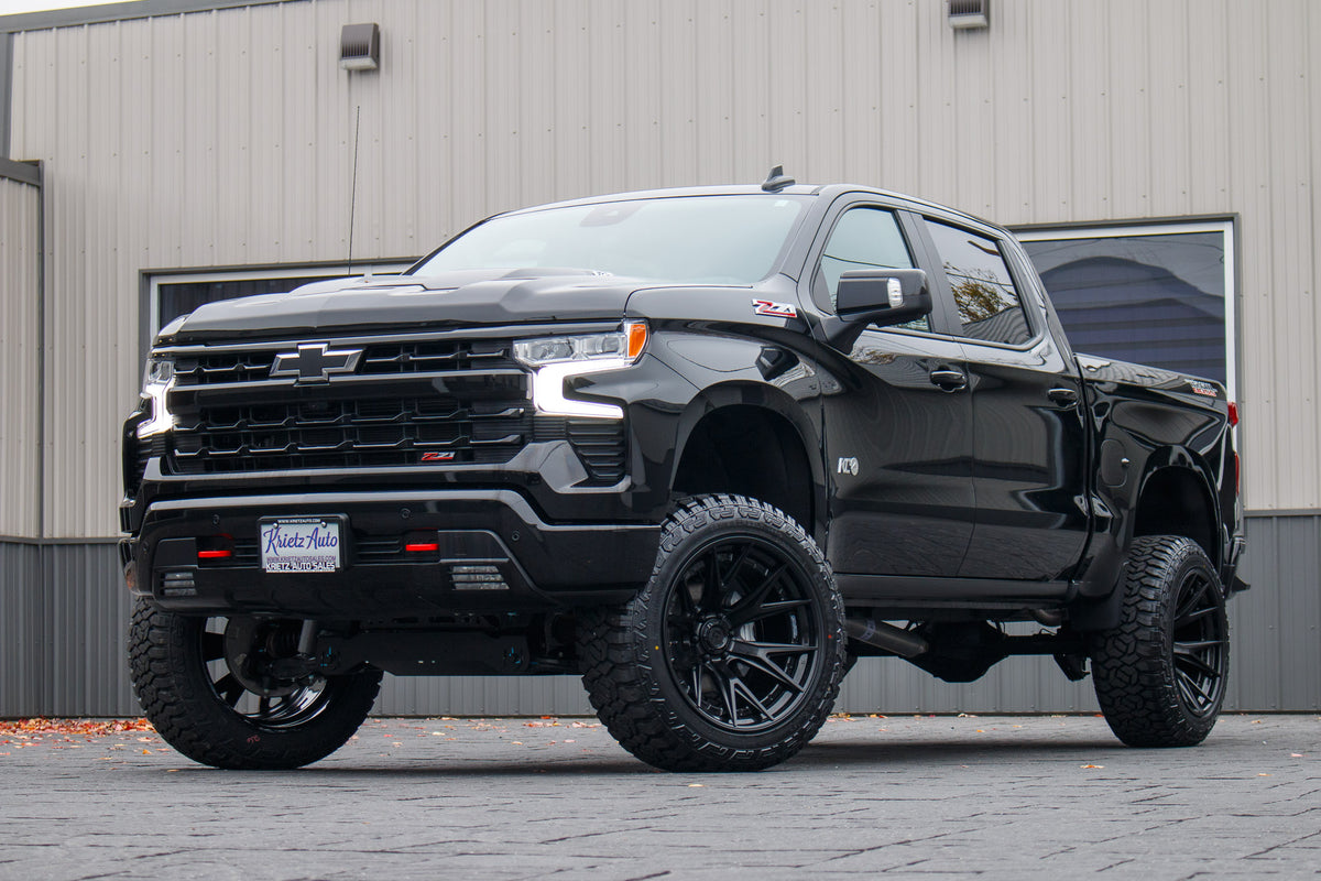 2024 Chevrolet Silverado 1500 LT Trail Boss with a 6" Rough Country lift kit, 22x12 Fuel Catalyst wheels, and 35" Fury Country Hunter R/T tires.