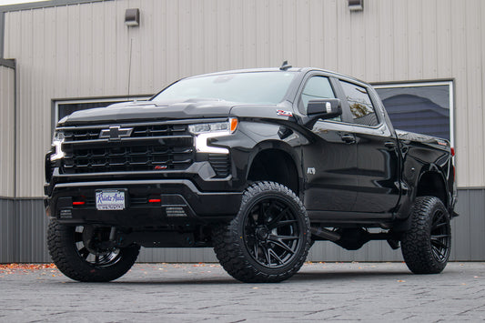 2024 Chevrolet Silverado 1500 LT Trail Boss with a 6" Rough Country lift kit, 22x12 Fuel Catalyst wheels, and 35" Fury Country Hunter R/T tires.