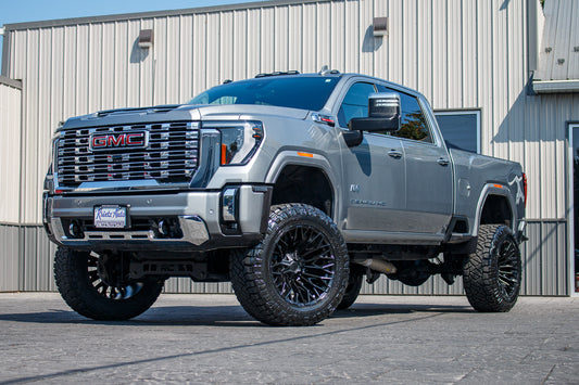 2024 GMC Sierra 2500 Denali with a 5" Rough Country lift kit, 22x12 Fuel Strike wheels, and 37" Nitto Ridge Grappler tires.