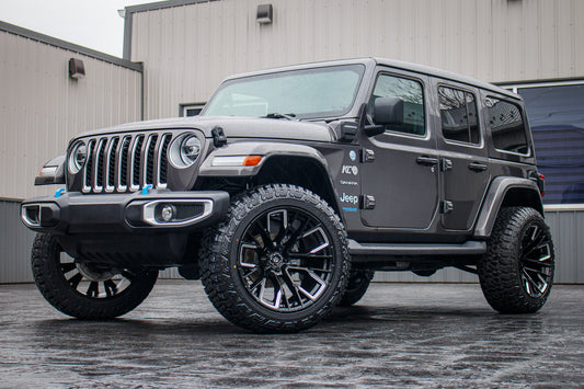 2022 Jeep Wrangler Unlimited Sahara 4XE with a 2.5" Rough Country lift kit, 22x12 Fuel Rebar wheels, and 35" Fury Country Hunter R/T tires.