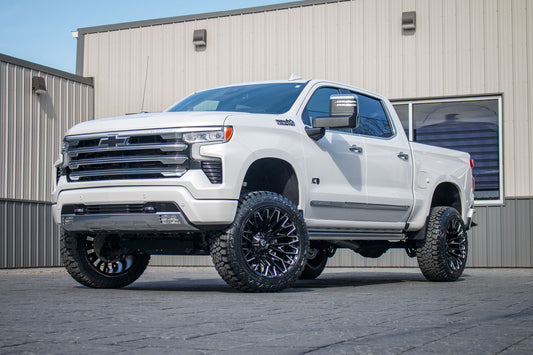 2024 Chevrolet Silverado 1500 High Country lift kit, 22x12 Fuel Strike wheels, and 35" Fury Country Hunter R/T tires.