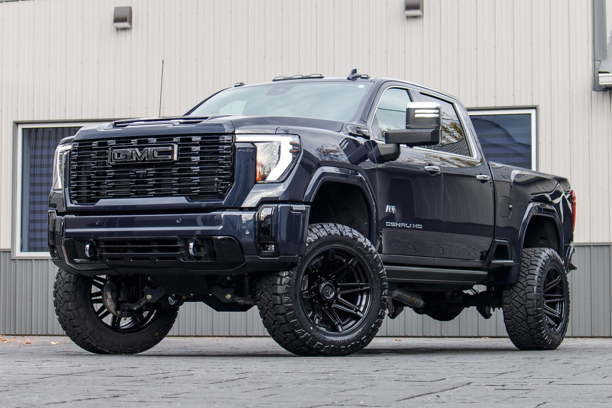 2024 GMC Sierra 2500 Denali Ultimate with a 5" BDS lift kit, 22x12 Fuel Brawl wheels, and 37" Nitto Ridge Grappler tires.