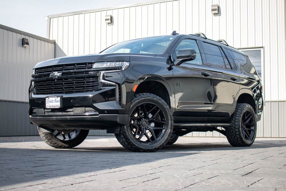 2023 Chevrolet Tahoe RST with a 3" ReadyLift lift kit, 22x10 Fuel Flux wheels, and 295/50 Toyo Open Country A/T III tires.