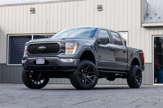 2022 Ford F-150 XLT with a 6" Rough Country lift kit, 22x12 Fuel Flux wheels, and Fury Country Hunter R/T tires.