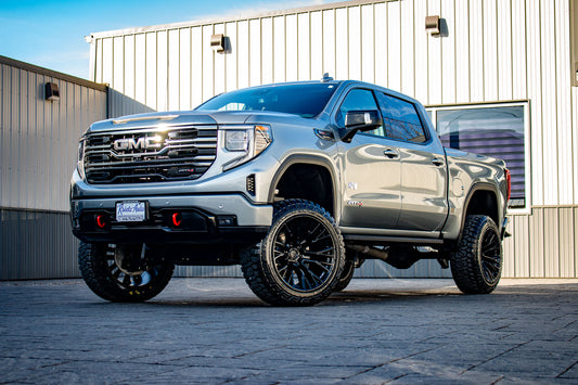 2024 GMC Sierra 1500 AT4 with a 6" Rough Country lift kit, 22x12 Fuel Rebar wheels, and 35" Fury Country Hunter R/T tires.