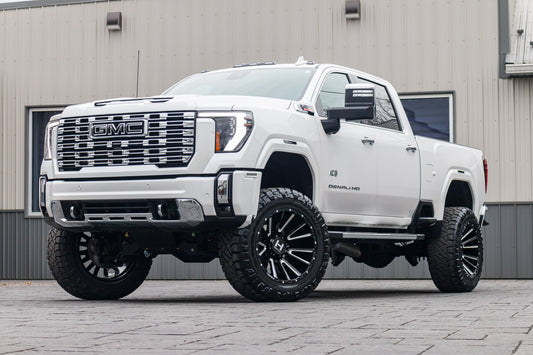 2024 GMC Sierra 2500 Denali with a 5" BDS lift kit, 22x12 Hostile H123 wheels, and 37" Nitto Ridge Grappler.
