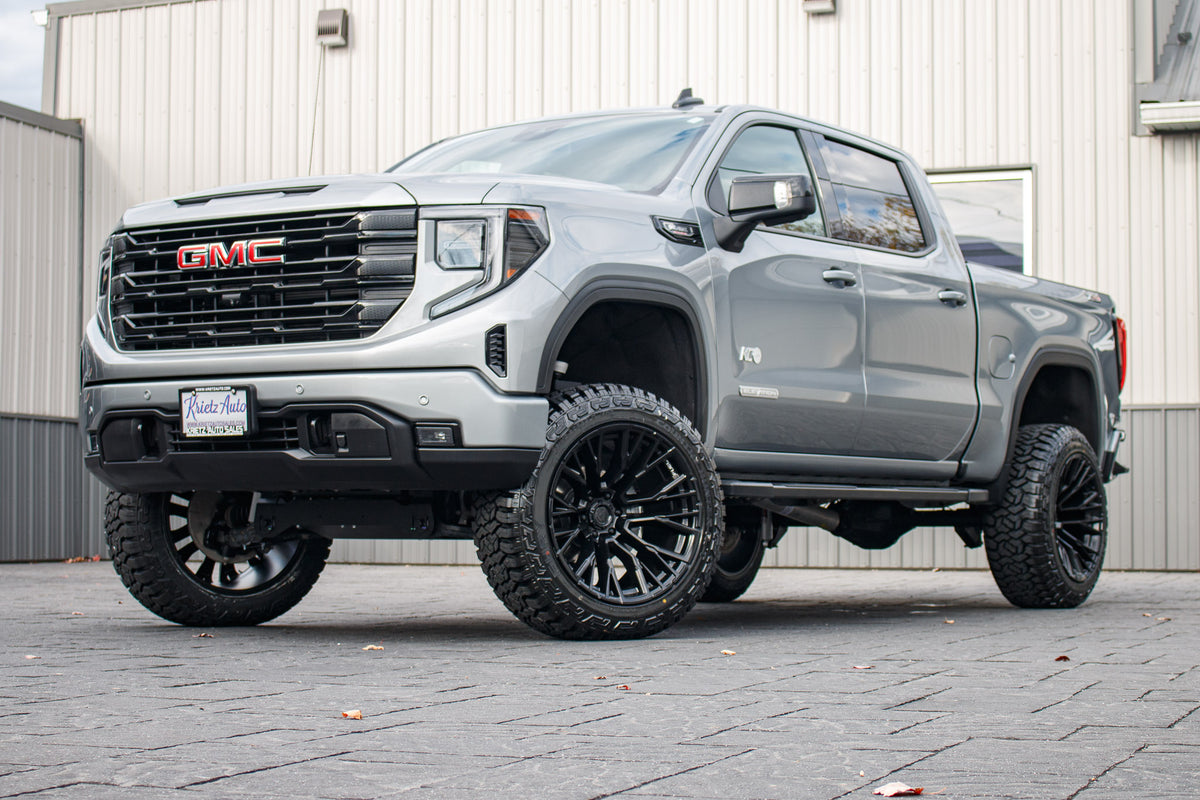 2024 GMC Sierra 1500 Elevation with a 6" Rough Country lift kit, 22x12 Fuel Rebar wheels, and 35" Fury Country Hunter R/T tires.