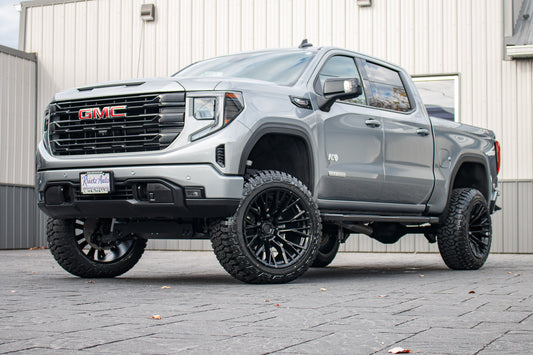 2024 GMC Sierra 1500 Elevation with a 6" Rough Country lift kit, 22x12 Fuel Rebar wheels, and 35" Fury Country Hunter R/T tires.