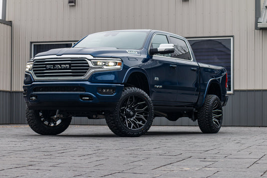 2024 Ram 1500 Limited Longhorn with a 6" Rough Country lift kit, 22x12 Fuel Twitch wheels, and 35" Fury Country Hunter R/T tires.
