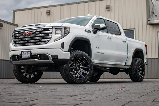 2024 GMC Sierra 1500 Denali with a 6" Rough Country Lift kit, 22x12 Fuel Contra wheels, and 35" Fury Country Hunter R/T tires.