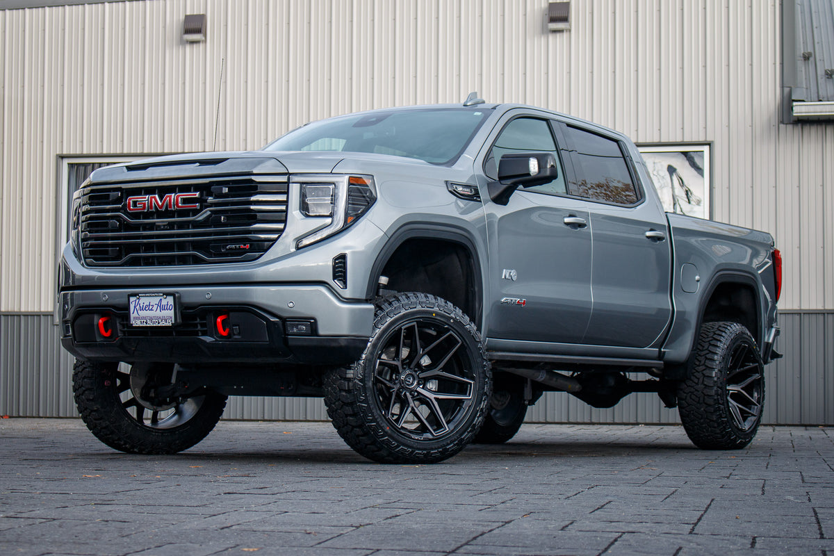 2024 GMC Sierra 1500 AT$ with a 6" Rough Country lift kit, 22x12 Fuel Flux wheels, and 35" Fury Country Hunter R/T tires.