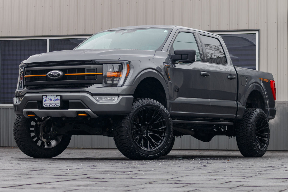 2023 Ford F-150 Tremor with a 6" Rough Country lift kit, 22x12 Fuel Rebar wheels, and 35" Fury Country Hunter R/T tires.