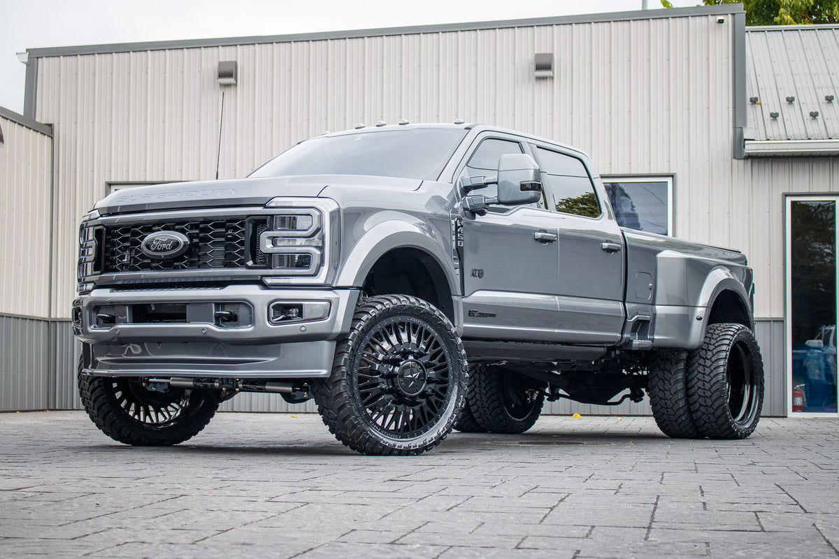 2024 Ford F-450 Super Duty with a 4" Wicked lift kit, 26x8.25 American Force Business wheels, and 37" Fury Country Hunter M/T tires.